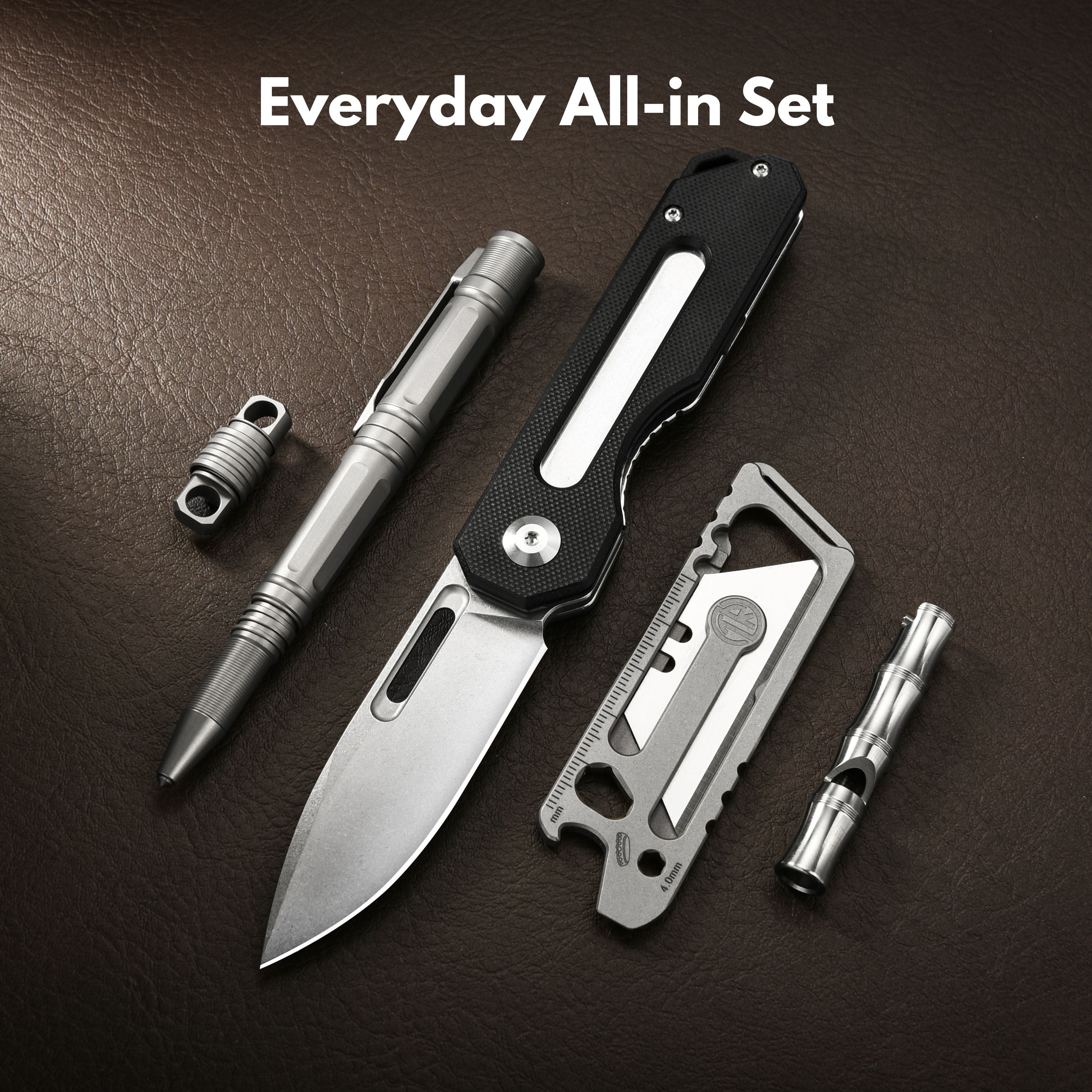 Tacray Everyday All-in Carry set with knife, pen, and tools on a brown leather background